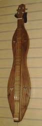 McSpadden Sweet Song with Walnut top and back (slimmer body in teardrop shape) with nylon case available from Prussia Valley Dulcimer Acoustic Music Shop