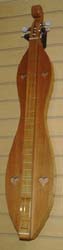 McSpadden scrollhead hourglass dulcimer - Cherry and Redwood with standard case available from Prussia Valley Dulcimer Acoustic Music Shop